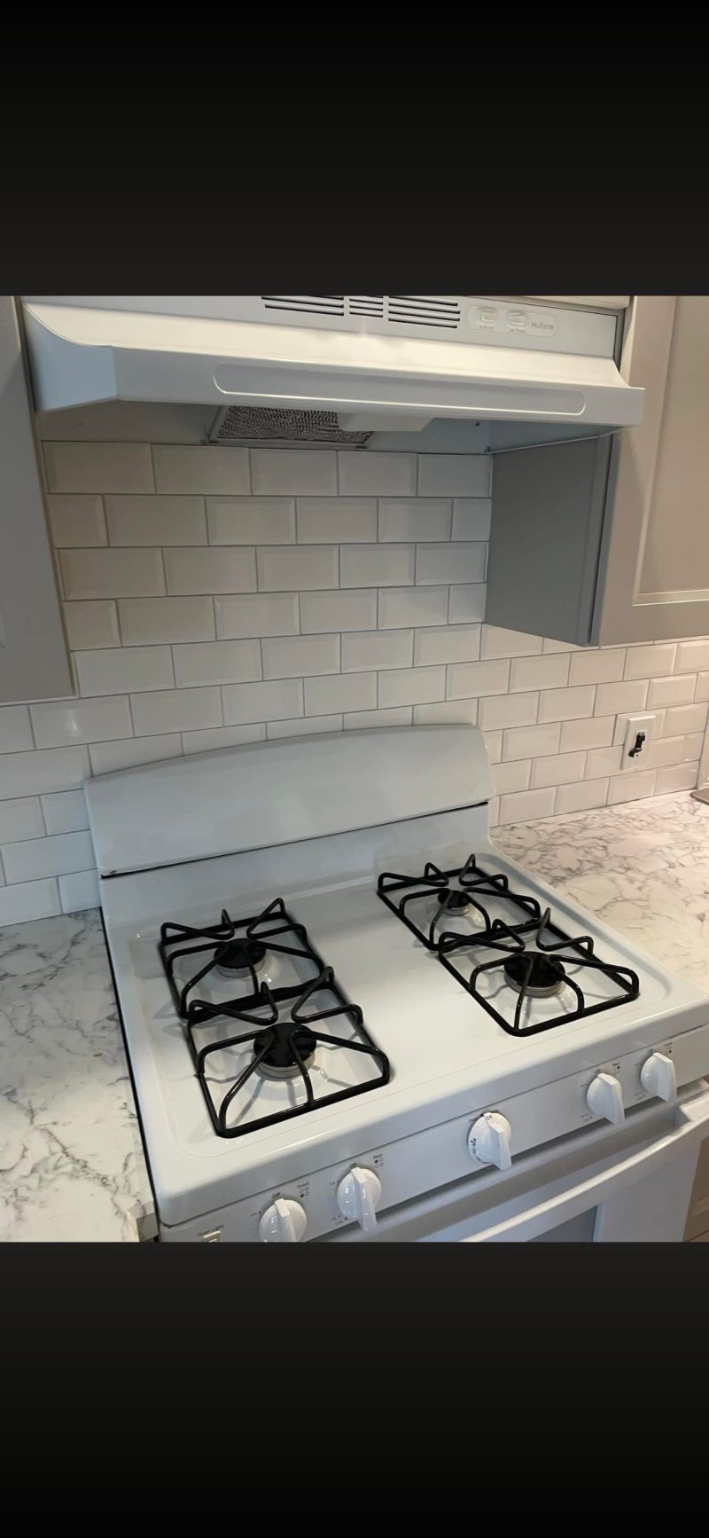Grey Shaker Cabinets & Subway Tile — photograph 3