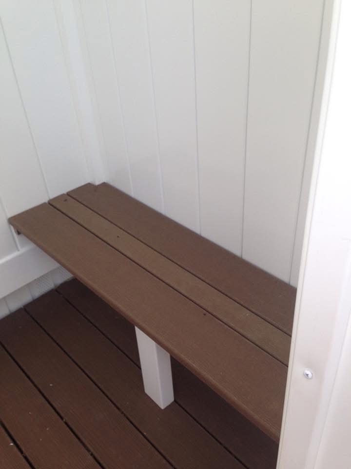 Outdoor Shower with Blue Siding — photograph 2