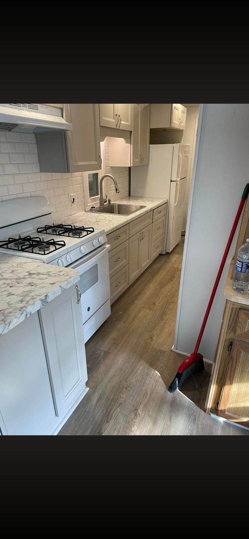 Grey Shaker Cabinets & Subway Tile — photograph 4