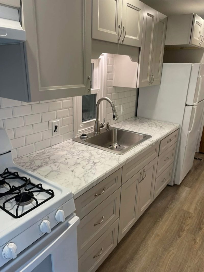Grey Shaker Cabinets & Subway Tile — photograph 1